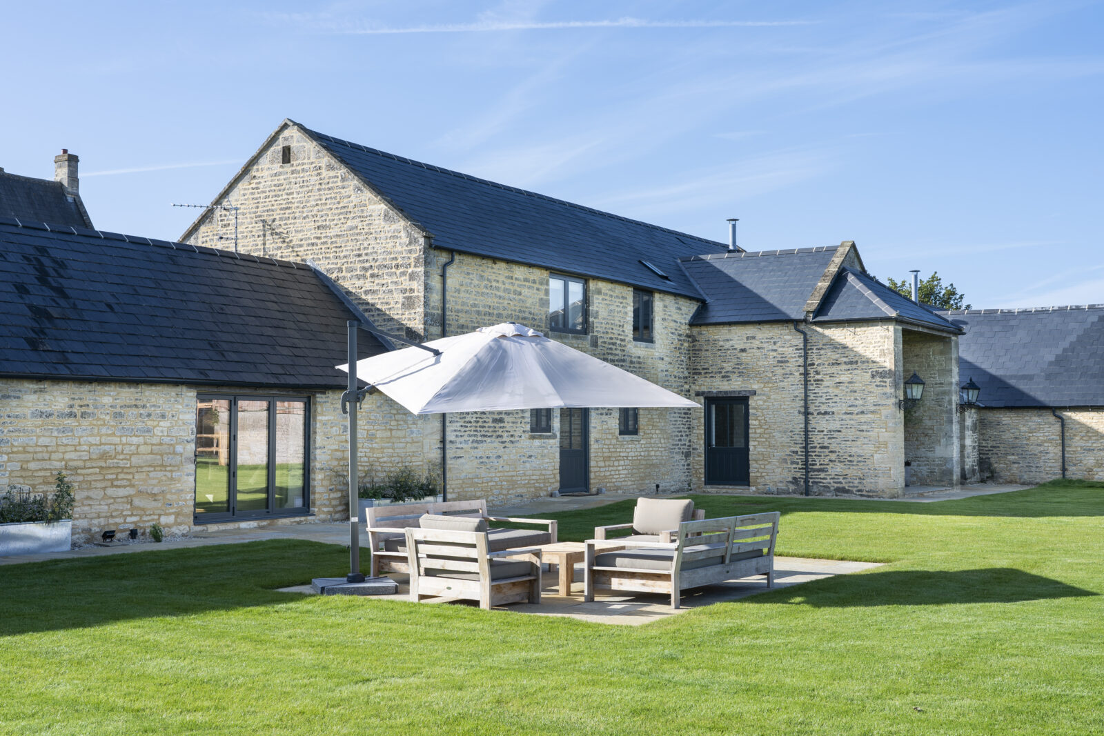 the grain store cotswolds garden outdoor dining