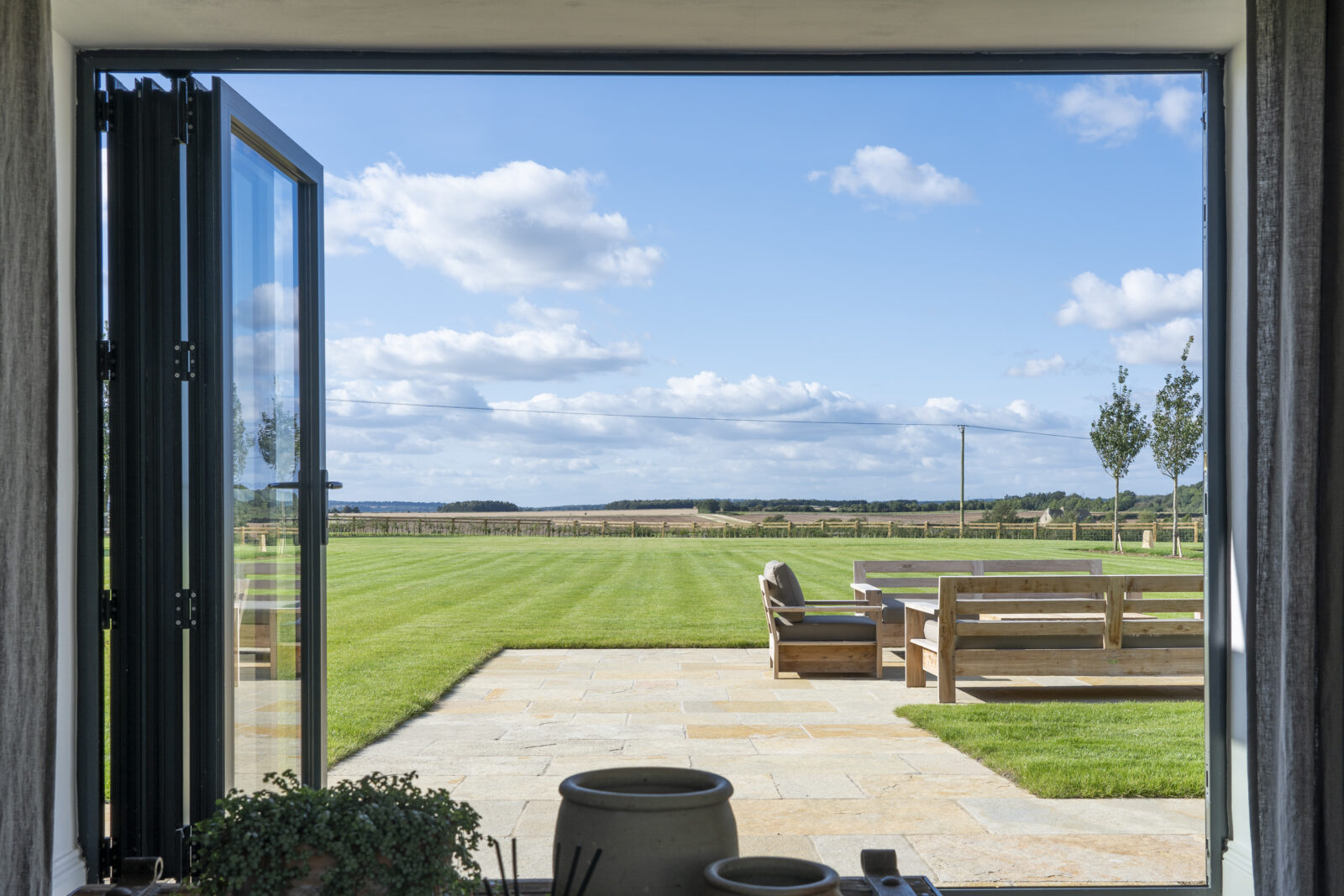 the grain store cotswolds garden view countryside