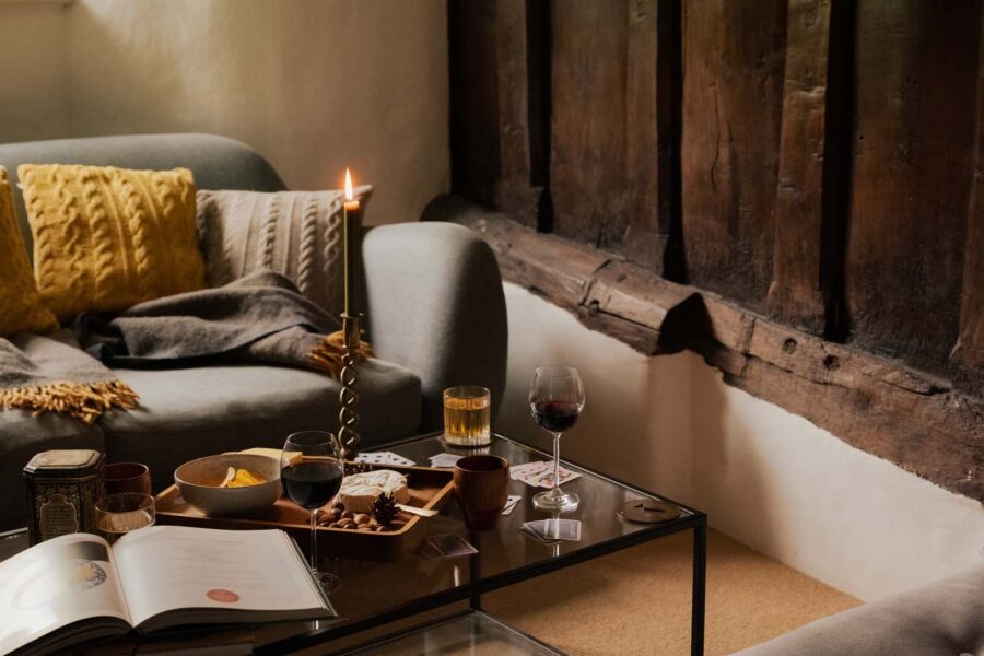 Cosy living room snug with glass of wine and cheese