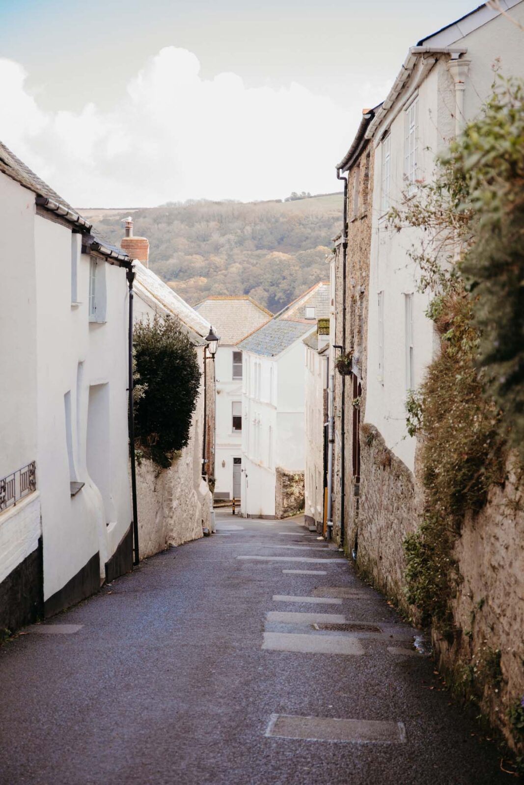 Narrow street with little white cottages