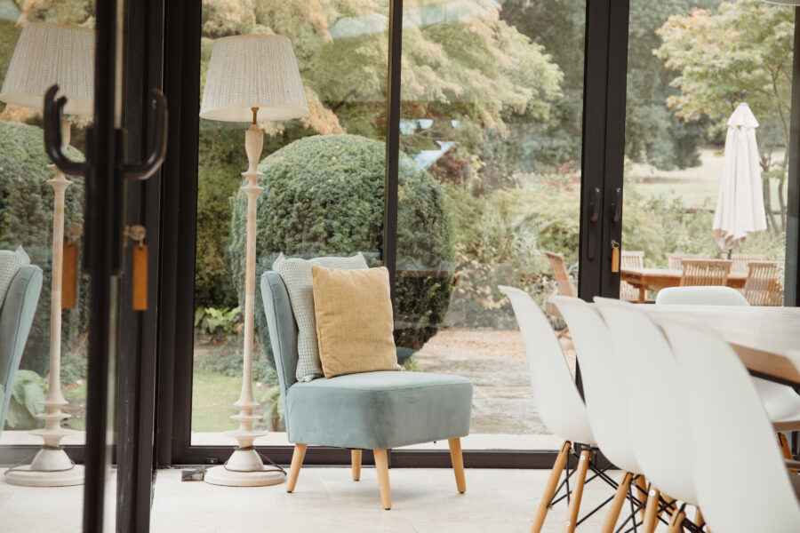 Room with bifold doors looking out to the garden area