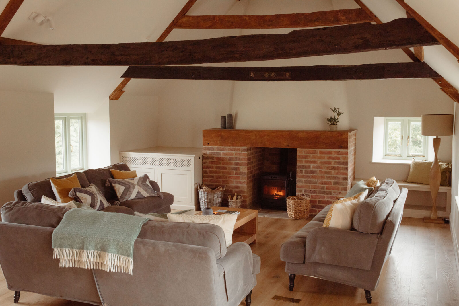 Sitting room with fireplace and wooden beams