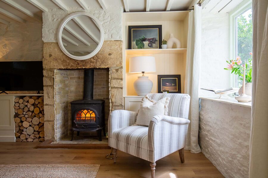 armchair next to fire in sitting room