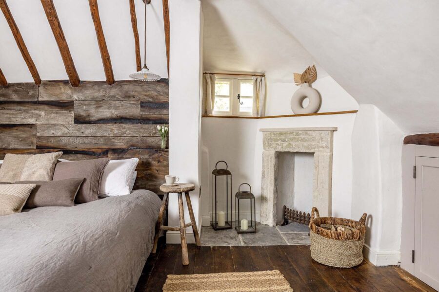 Bedroom with natural rustic decor and exposed wooden beams