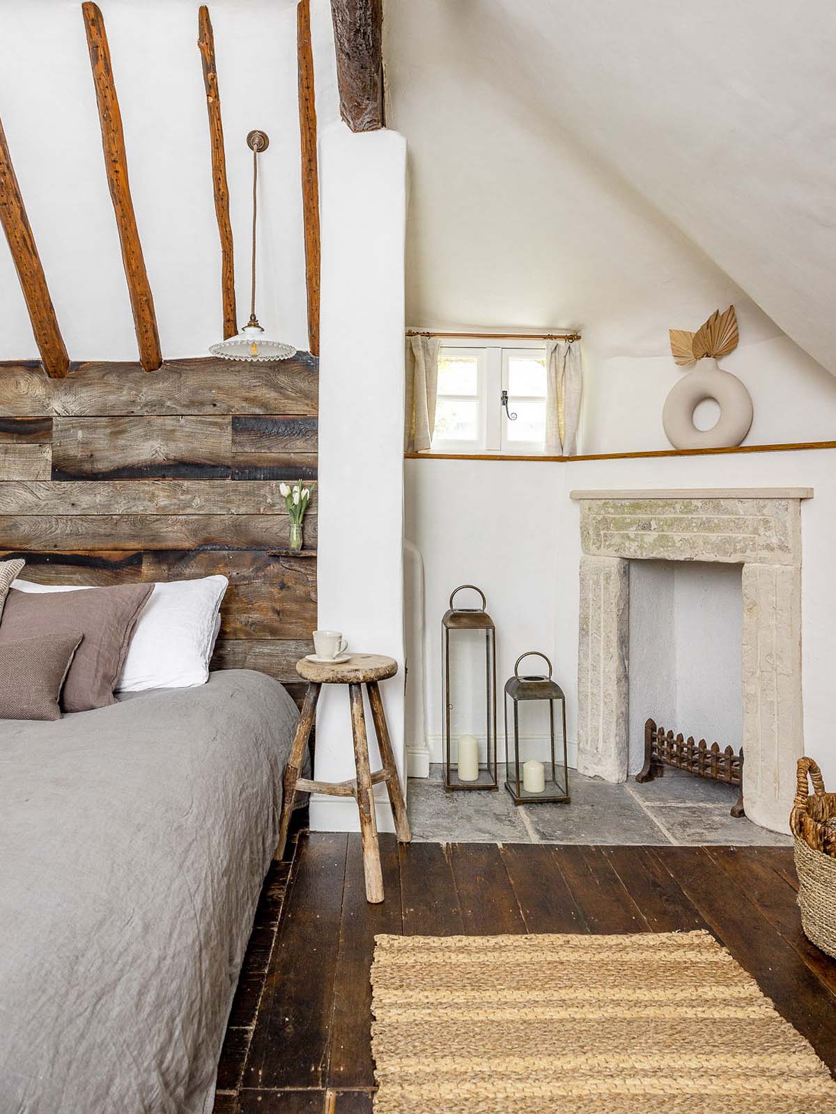 Bedroom with natural rustic decor and exposed wooden beams