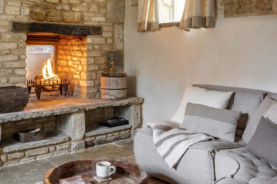 Modern grey corner sofa in a cosy cottage living room