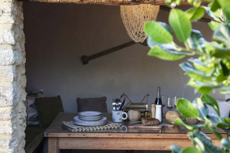 outdoor dining laid up undercover