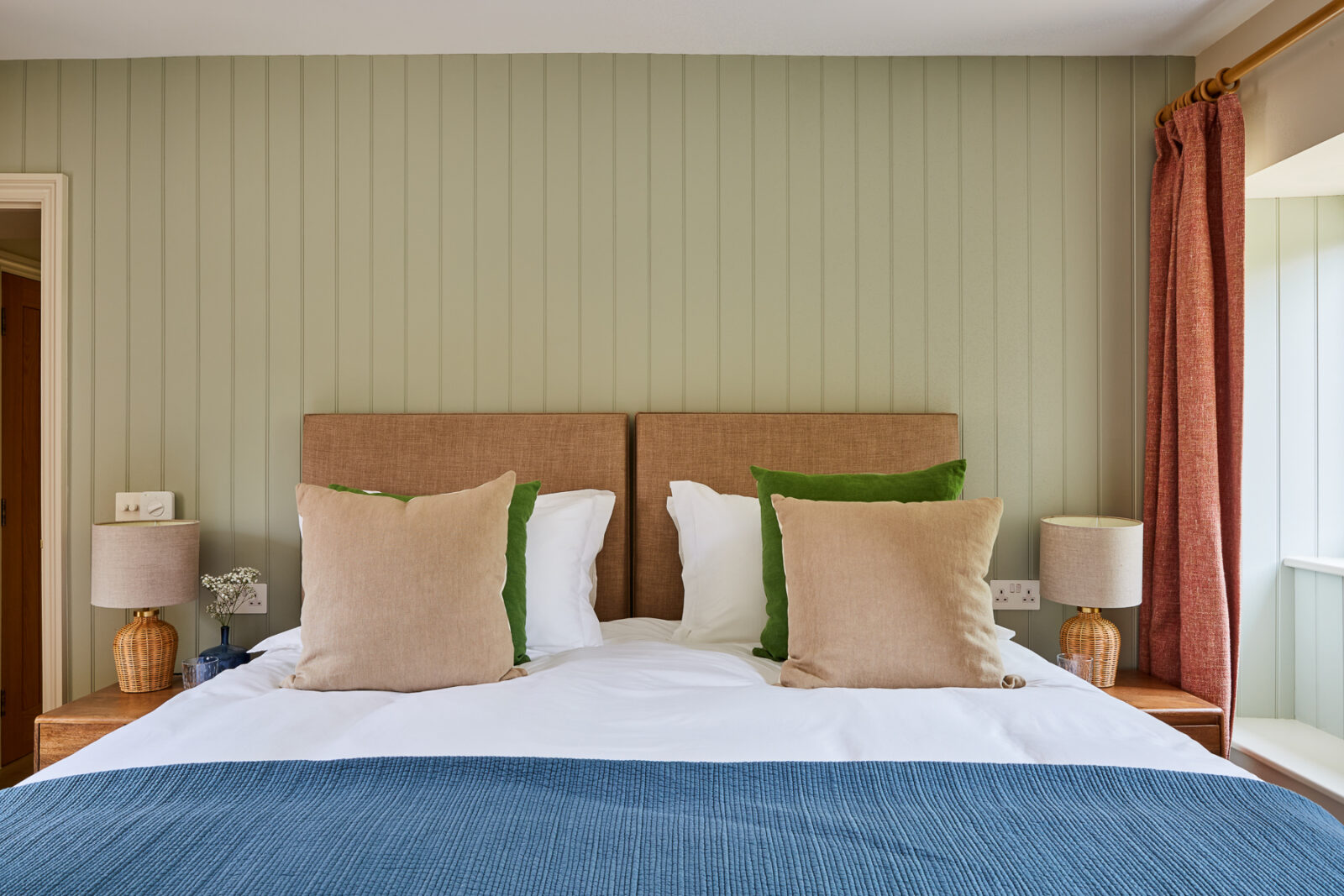 double bedroom with blue blanket