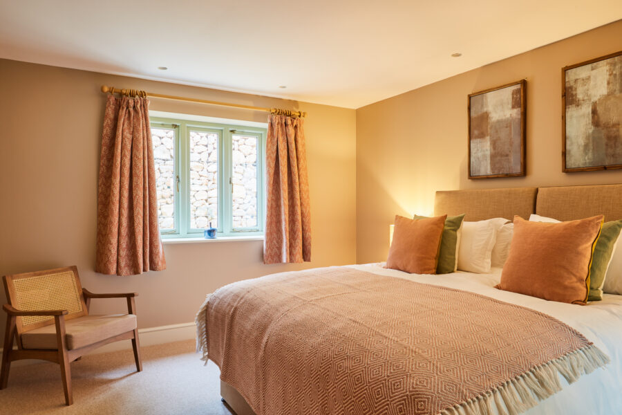 double bedroom with wooden chair