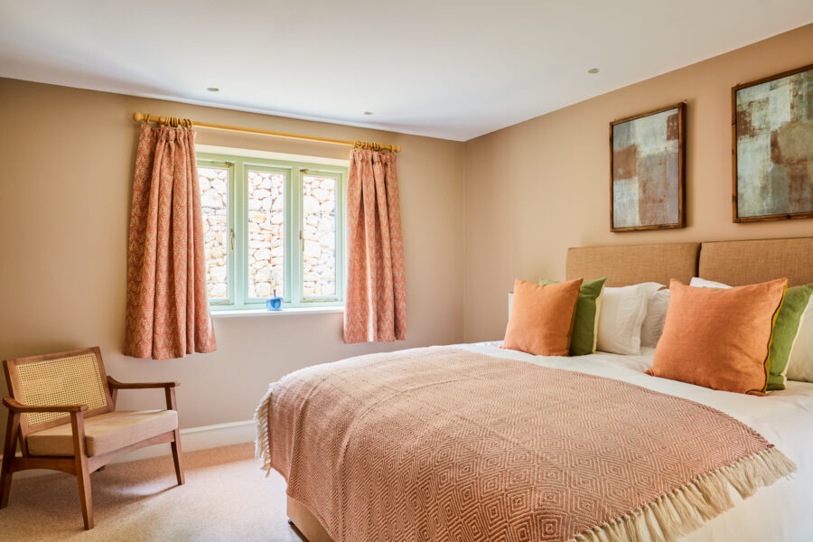 double bedroom with wooden chair