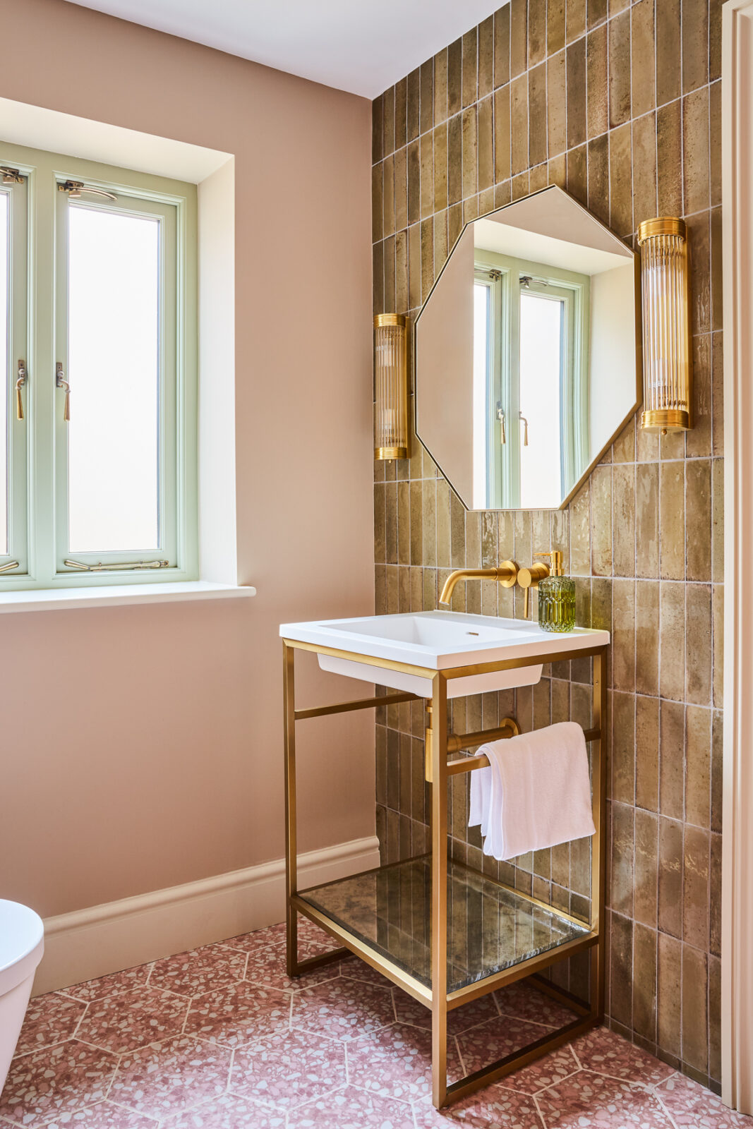 bathroom with brown tiles