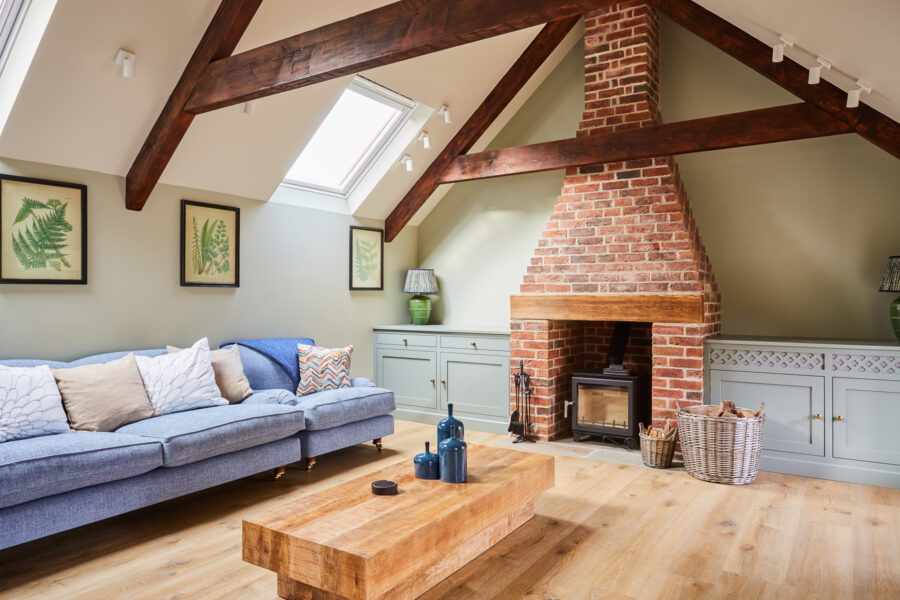 living room with red brick fire place