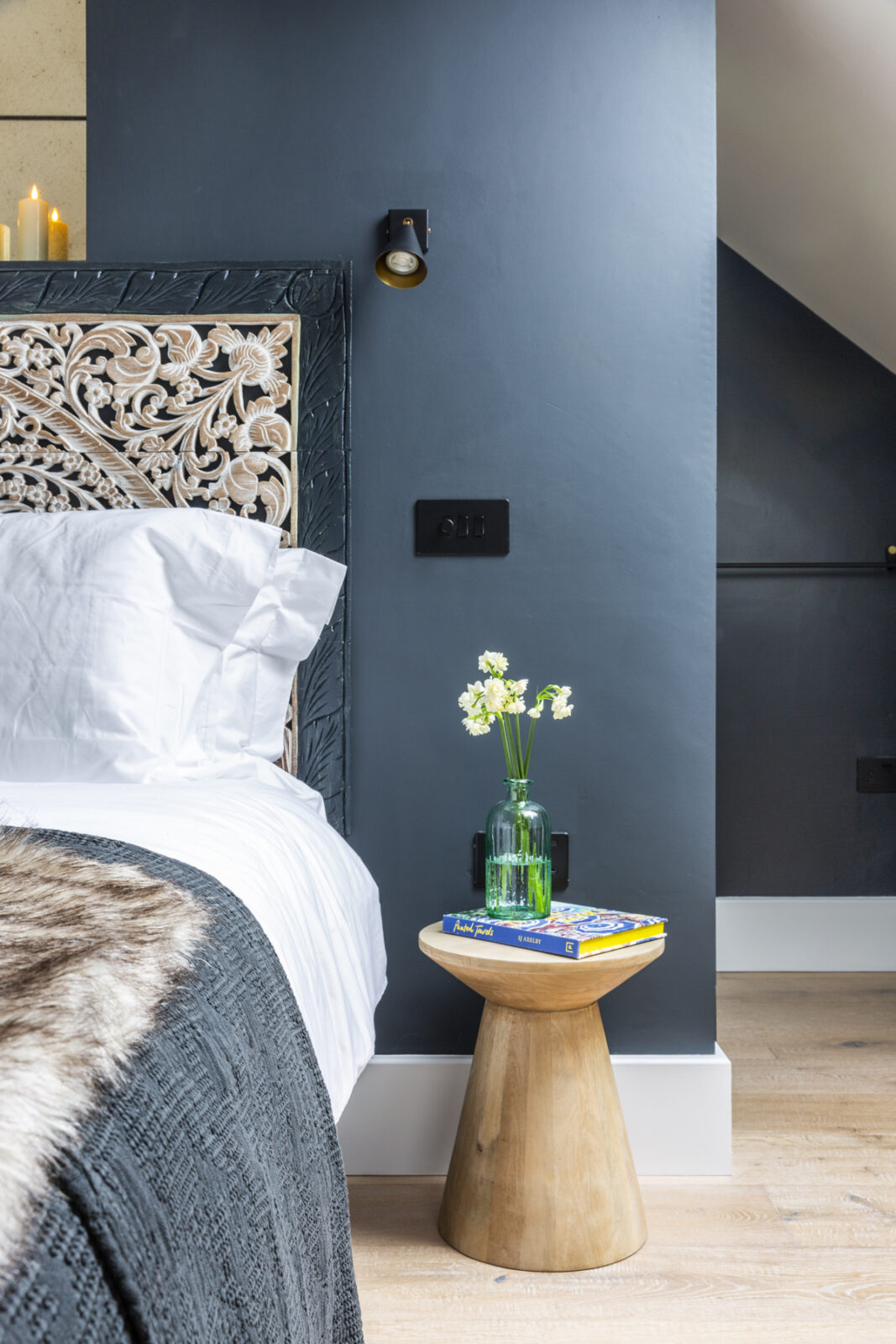 Small rustic wooden bedside table