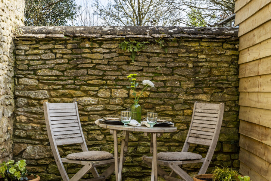 Outdoor patio with a table and two chairs